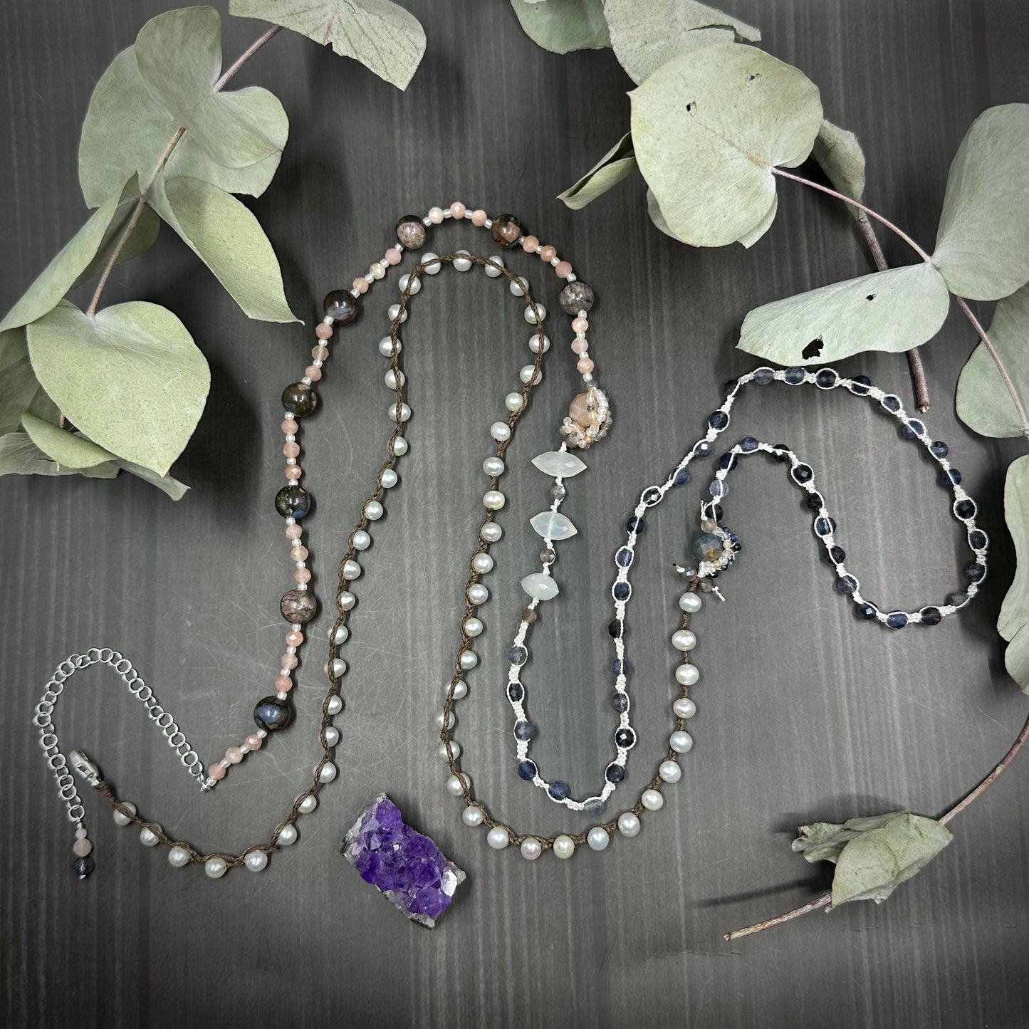 Incredibly intricate knotted and strung wrap piece with moonstone, iolite, sapphire, pearl, and more