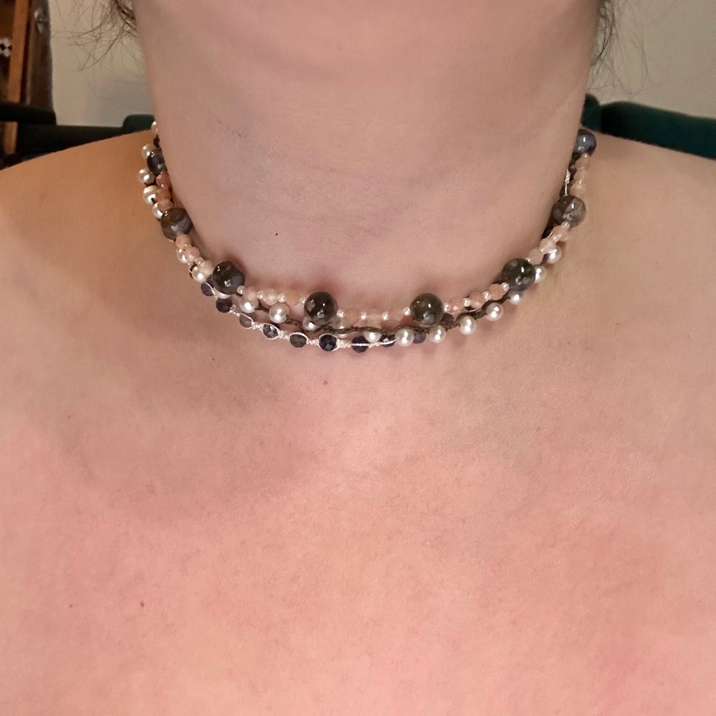 Incredibly intricate knotted and strung wrap piece with moonstone, iolite, sapphire, pearl, and more