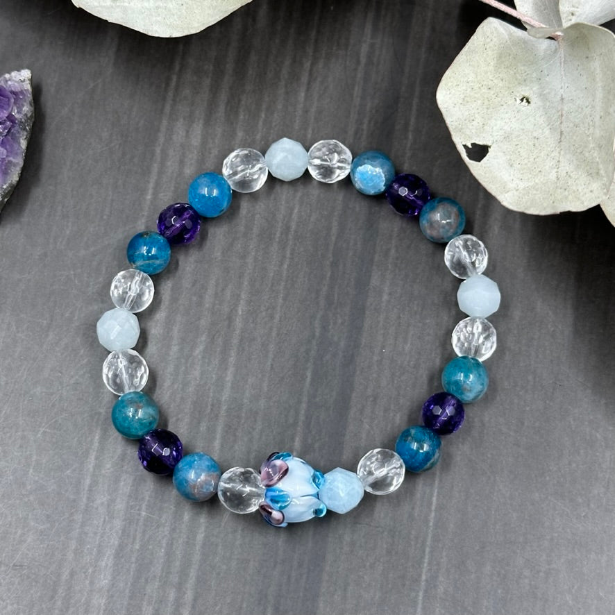 7 ¼" Stretch bracelet with Amethyst, Quartz, Aquamarine, Apatite, and Artisan Glass