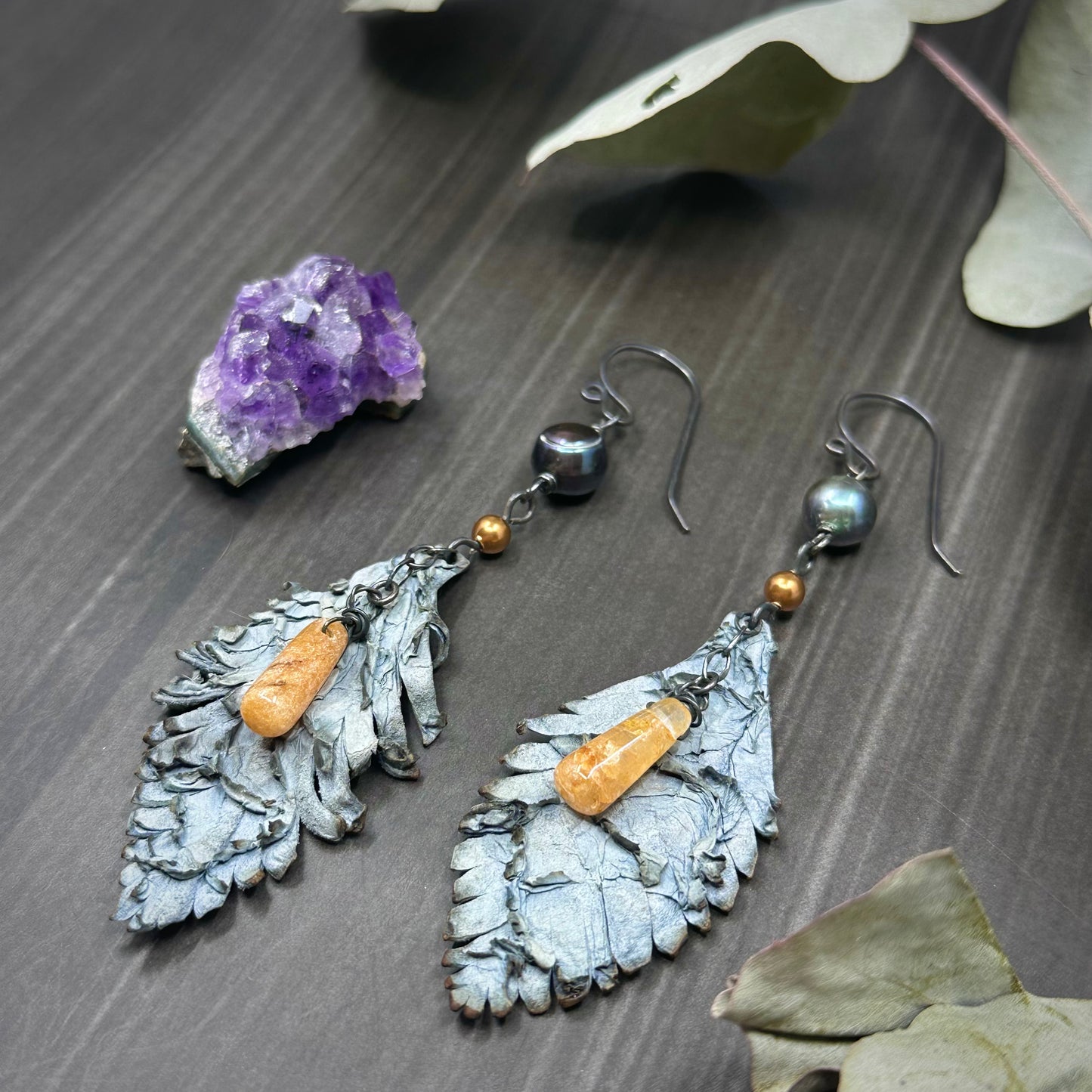 Aventurine, pearl, sterling silver, and leather feather earrings