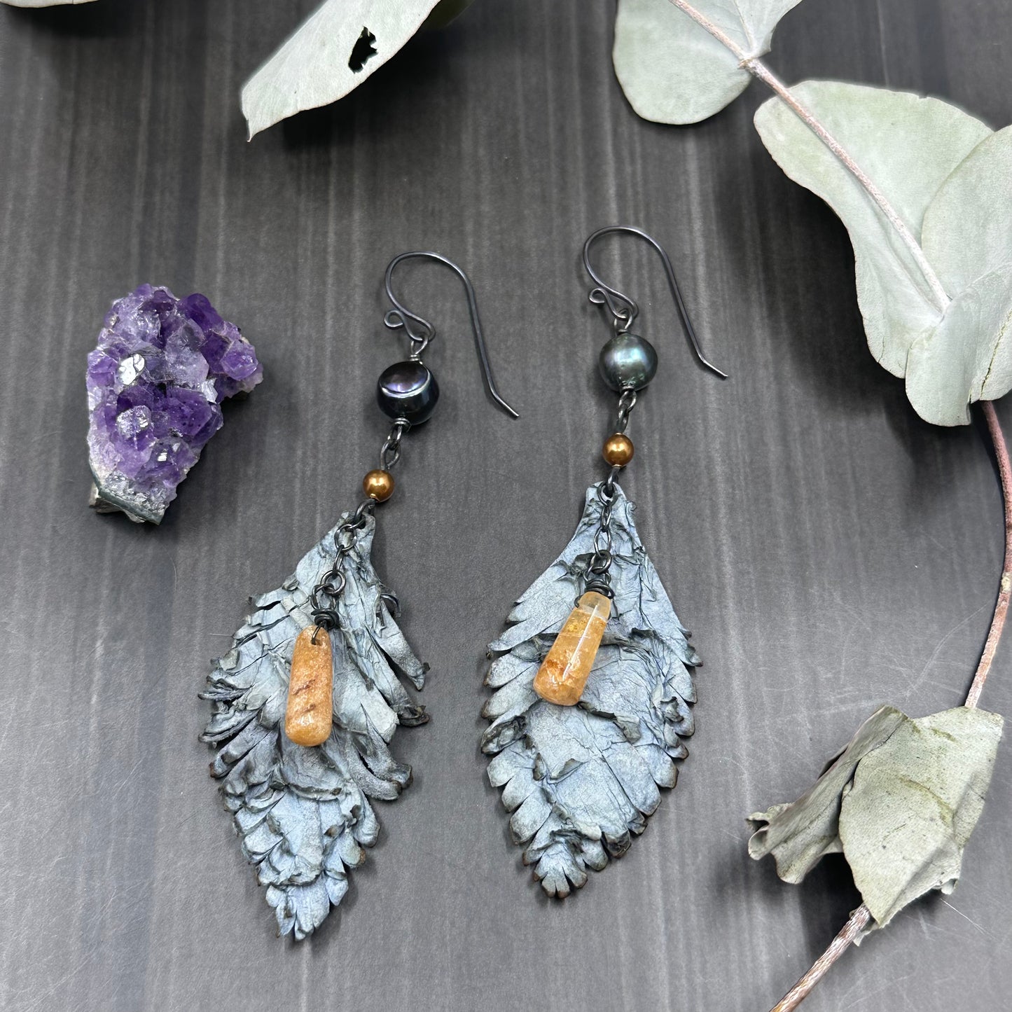Aventurine, pearl, sterling silver, and leather feather earrings