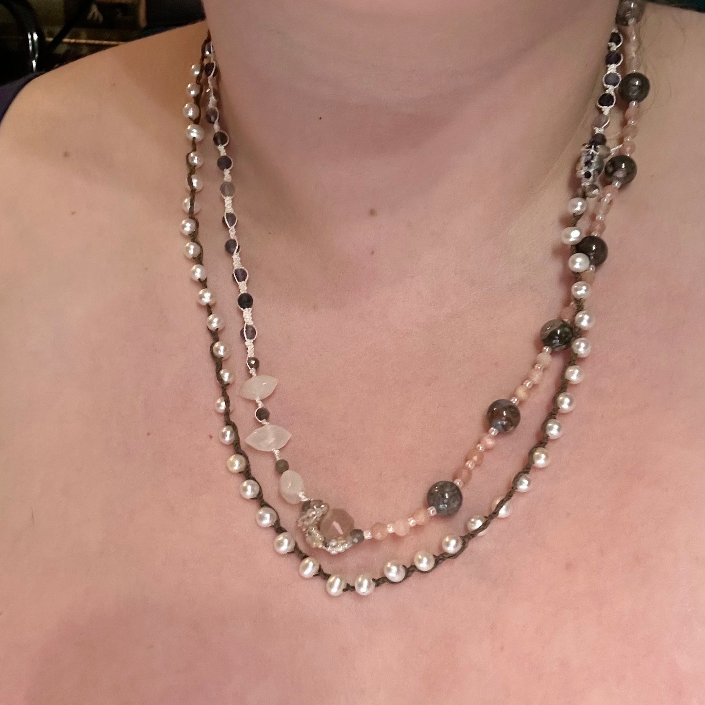 Incredibly intricate knotted and strung wrap piece with moonstone, iolite, sapphire, pearl, and more