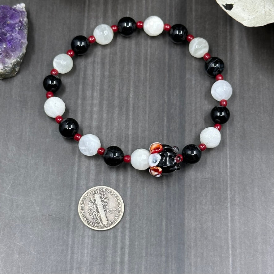 7 ¼" Stretch bracelet with artisan glass, quartz, czech glass, and onyx