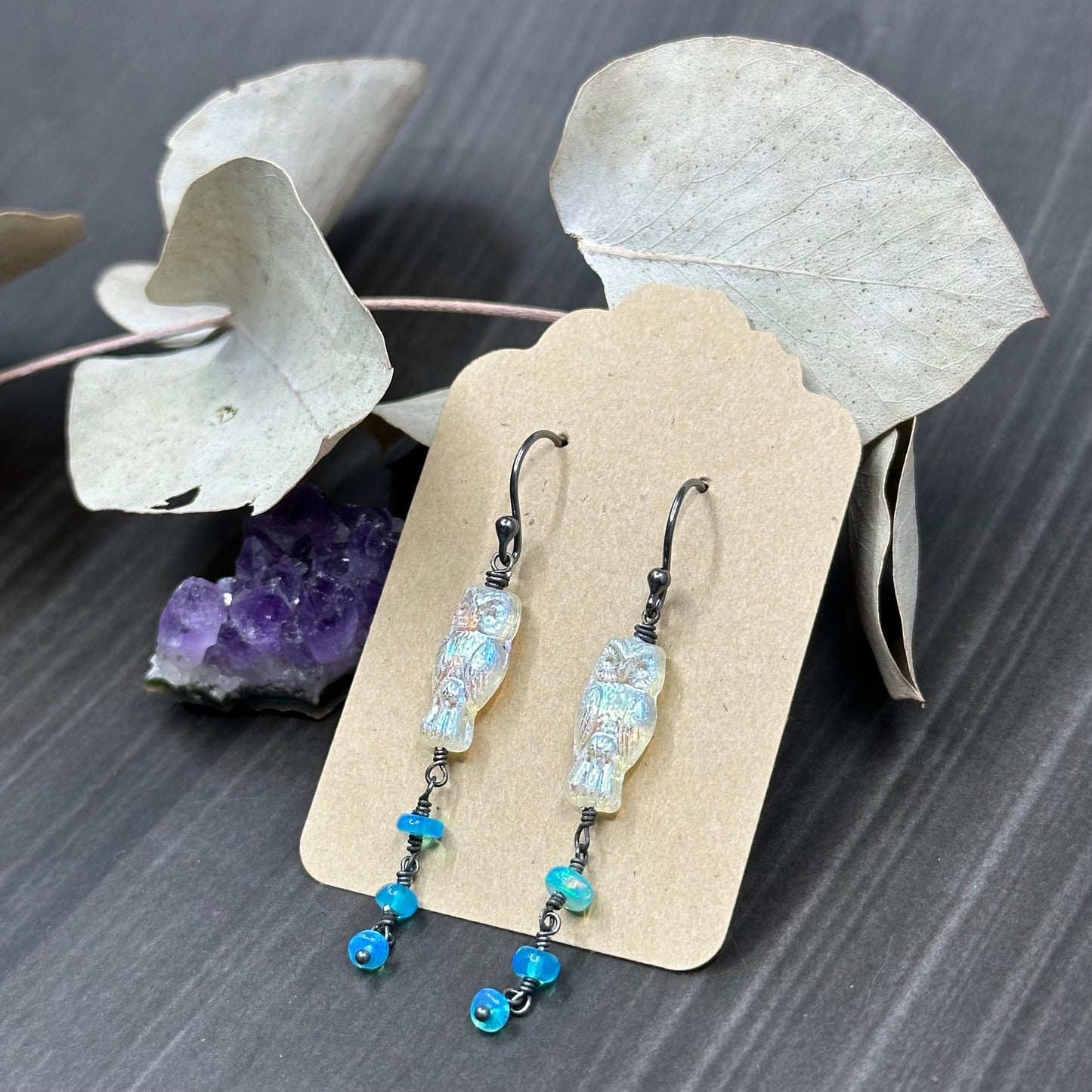 Moonstruck white with luster finish czech glass owls with sparkling Caribbean blue opals earrings
