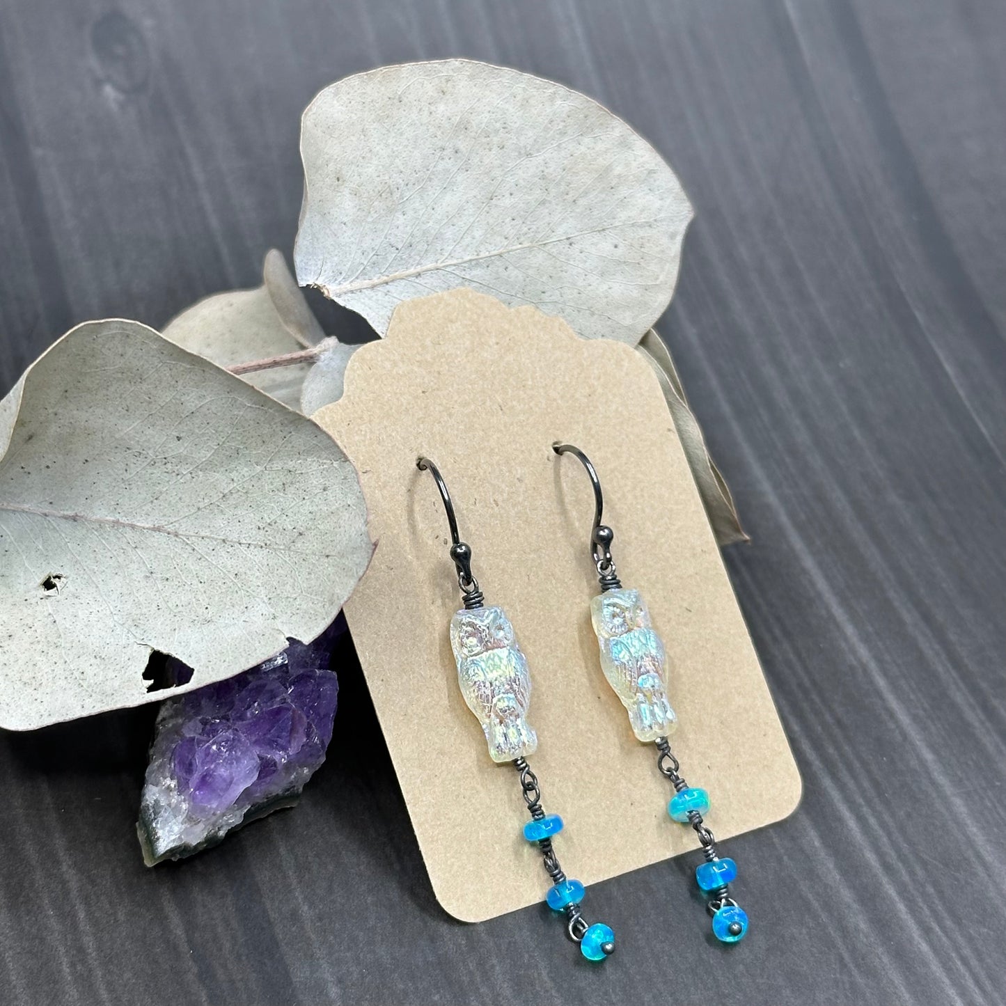 Moonstruck white with luster finish czech glass owls with sparkling Caribbean blue opals earrings
