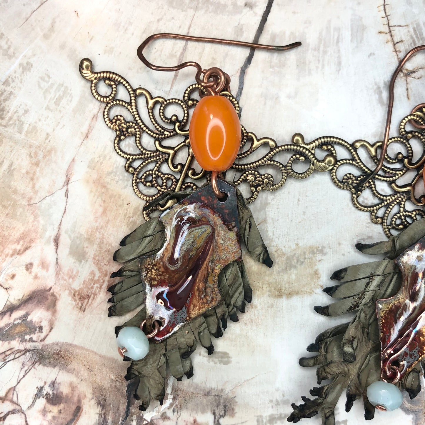 Leather feathers with vintage elements and Artisan Enamel