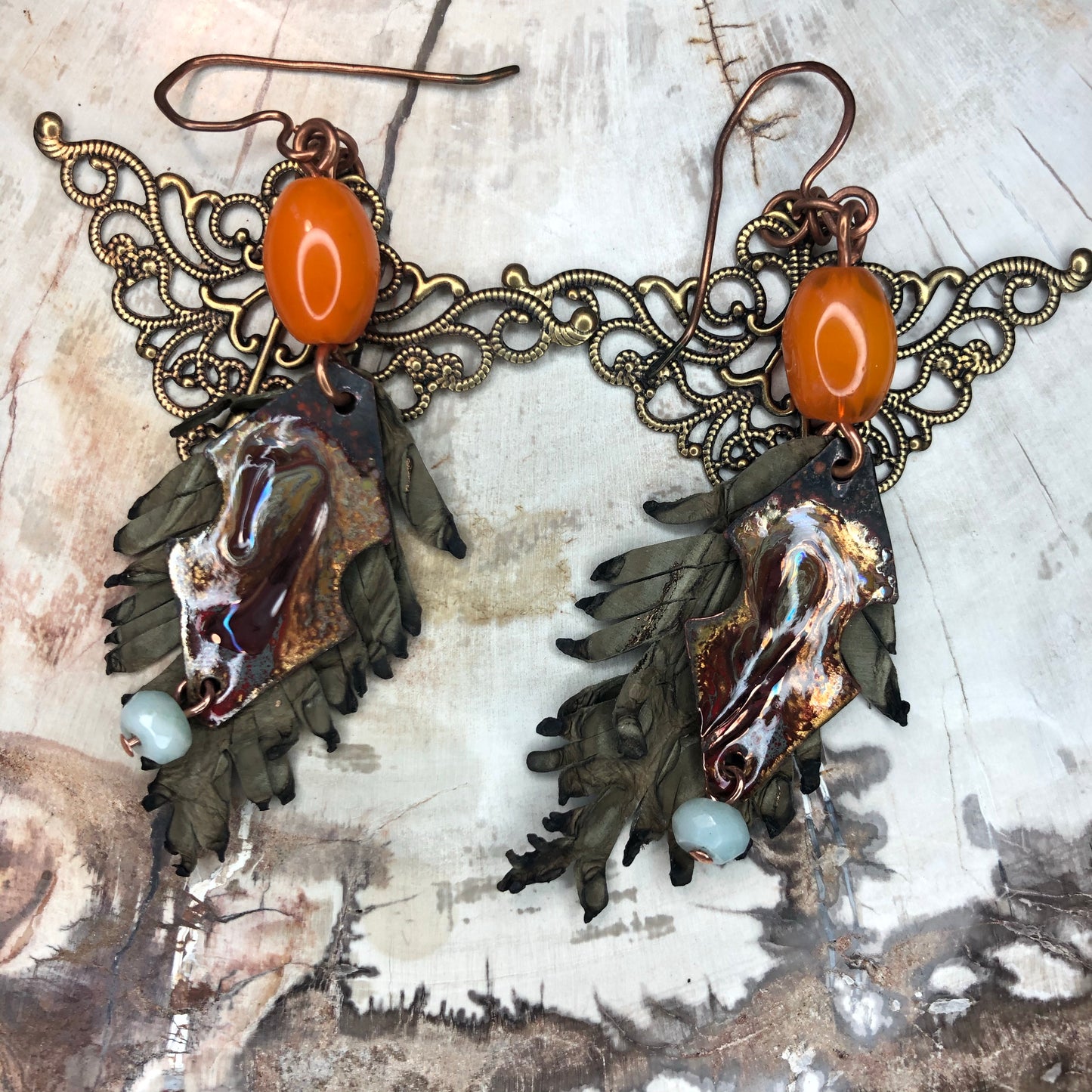 Leather feathers with vintage elements and Artisan Enamel