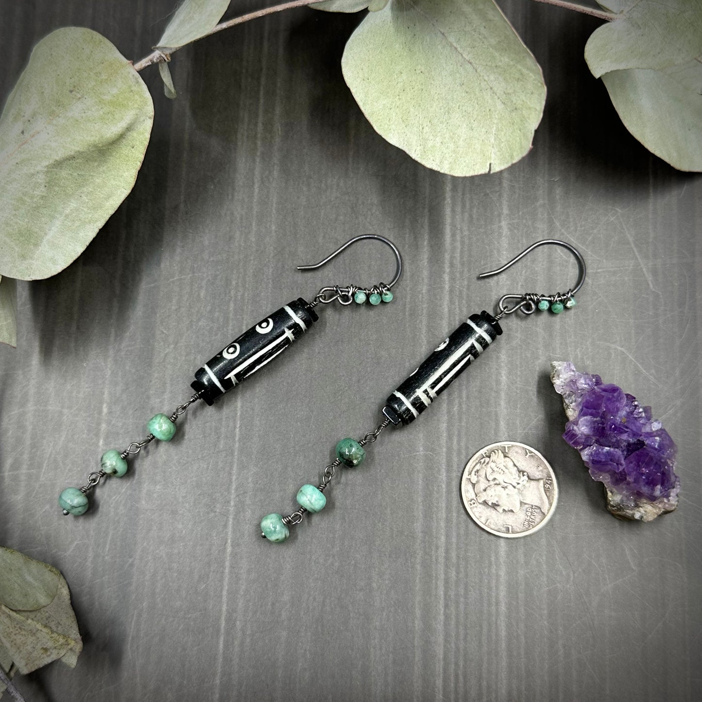Carved Bone Earrings with Black Spinel and Emeralds