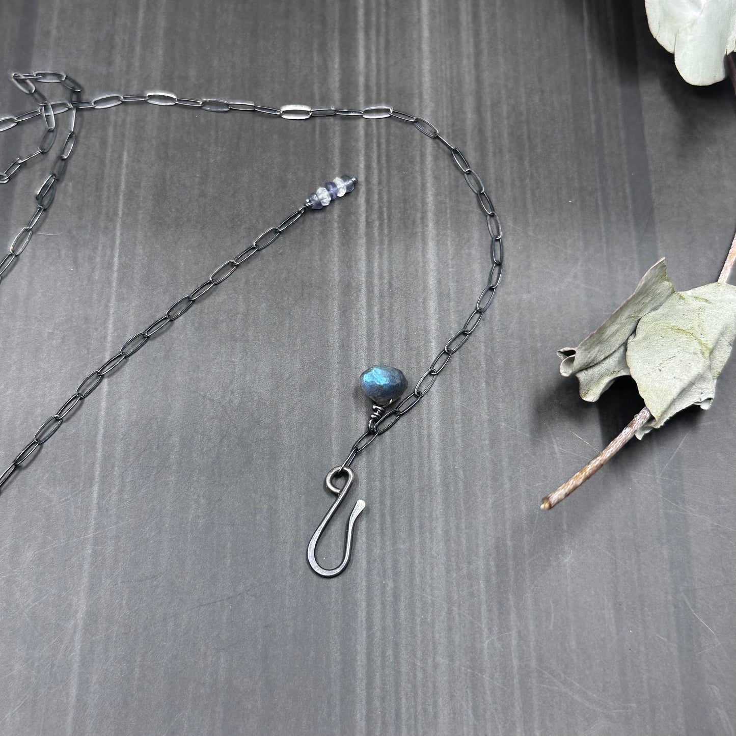 Rainbow moonstone, labradorite, iolite, pyrite, and sterling silver necklace