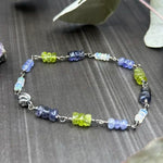 Load image into Gallery viewer, Peridot, Tanzanite, Opal, and Iolite Sterling Silver Bracelet
