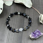 Load image into Gallery viewer, 7&quot; Glass and Sapphire Stretch Bracelet
