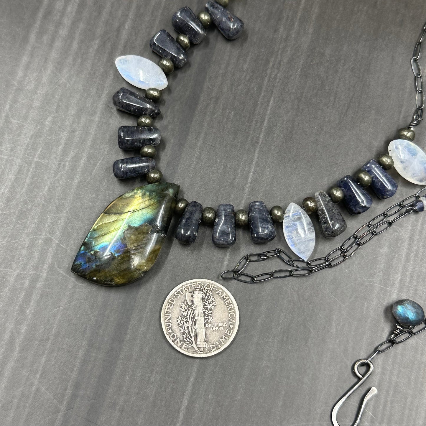 Rainbow moonstone, labradorite, iolite, pyrite, and sterling silver necklace