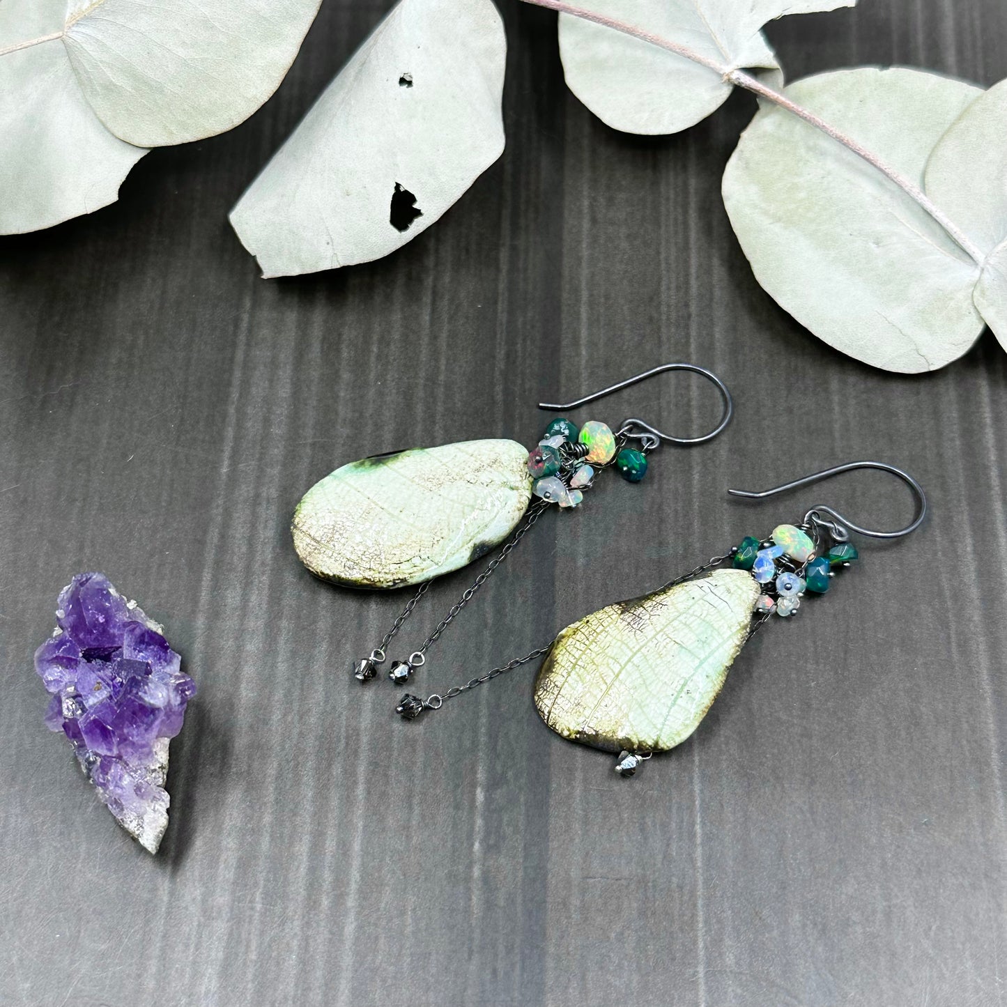 Wing and opal earrings in sterling silver