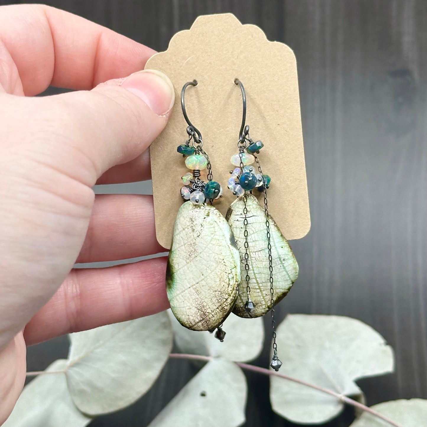 Wing and opal earrings in sterling silver