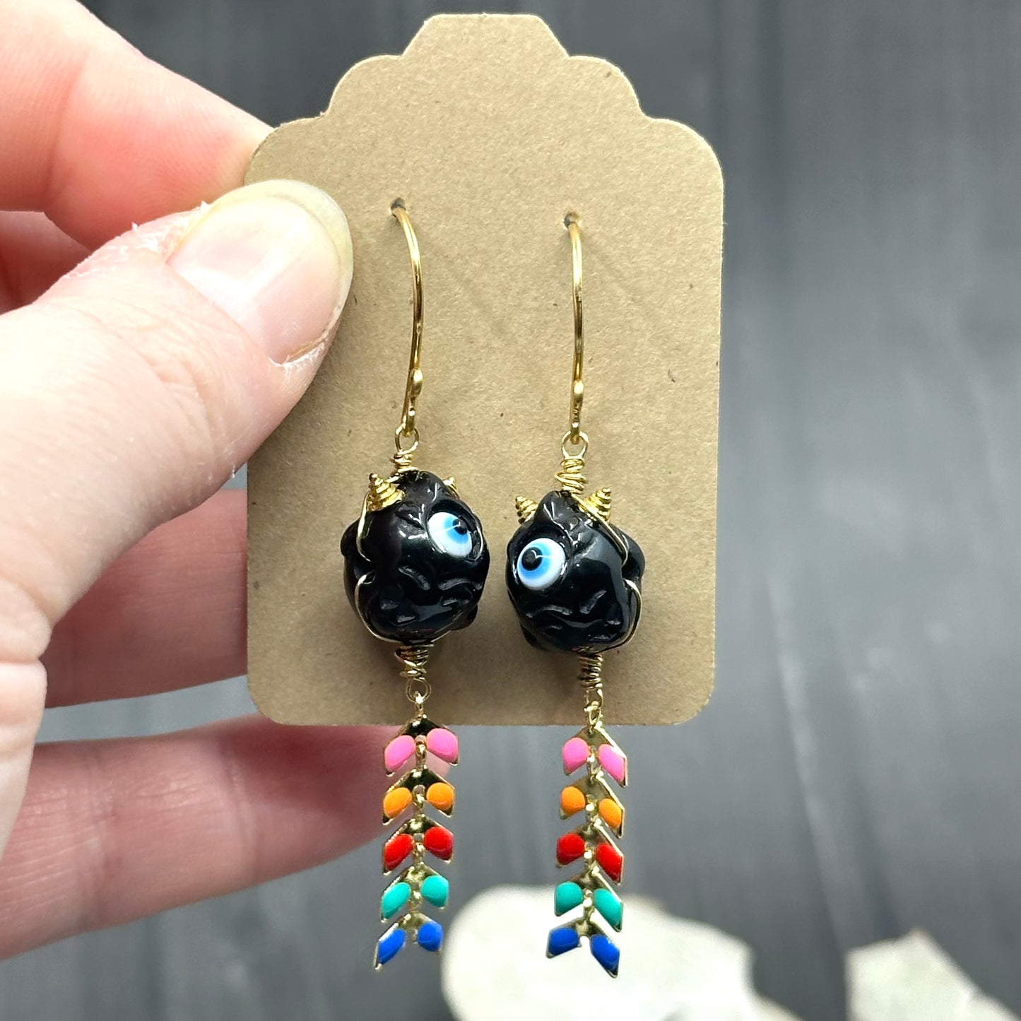 Rainbow Kite and Black Creature Brass Earrings