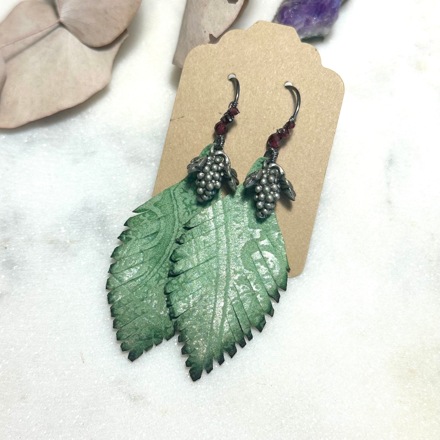 Leather feather, pewter grapes, and garnet Earrings with Sterling Silver