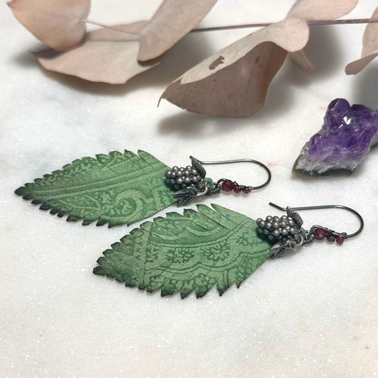 Leather feather, pewter grapes, and garnet Earrings with Sterling Silver