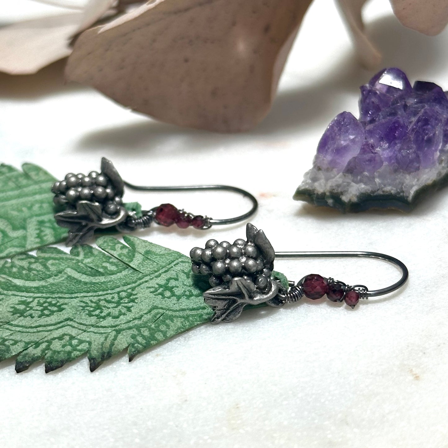 Leather feather, pewter grapes, and garnet Earrings with Sterling Silver