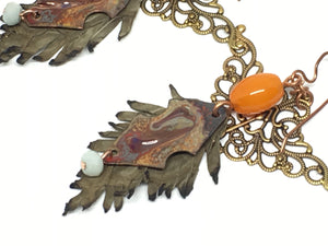 Leather feathers with vintage elements and Artisan Enamel