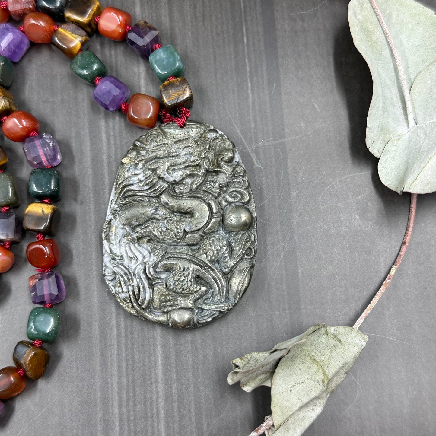 Long Knotted Statement Necklace with Carved Pyrite Dragon