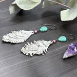 Load image into Gallery viewer, Howlite and Glass Pearl White Leather Feather Earrings
