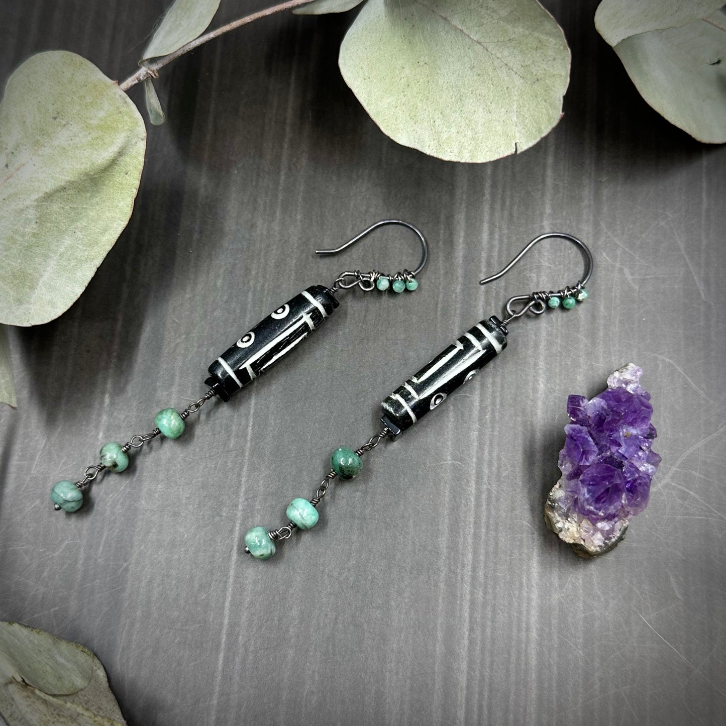Carved Bone Earrings with Black Spinel and Emeralds