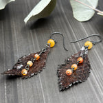 Load image into Gallery viewer, Snakeskin Leather Feather Earrings with Carnelian and Aventurine
