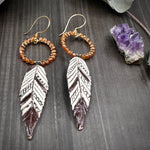 Load image into Gallery viewer, Hessonite Garnet and Ceramic Feather Earrings
