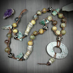 Load image into Gallery viewer, Carved Jade, Kyanite, Trade bead, and moss agate statement necklace
