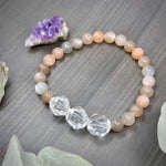 Load image into Gallery viewer, Crystal Quartz and AAA moonstone Stretch Bracelet
