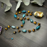 Load image into Gallery viewer, Tiger Eye, Apatite, Artisan Glass, and Sterling Silver Necklace
