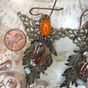 Leather feathers with vintage elements and Artisan Enamel