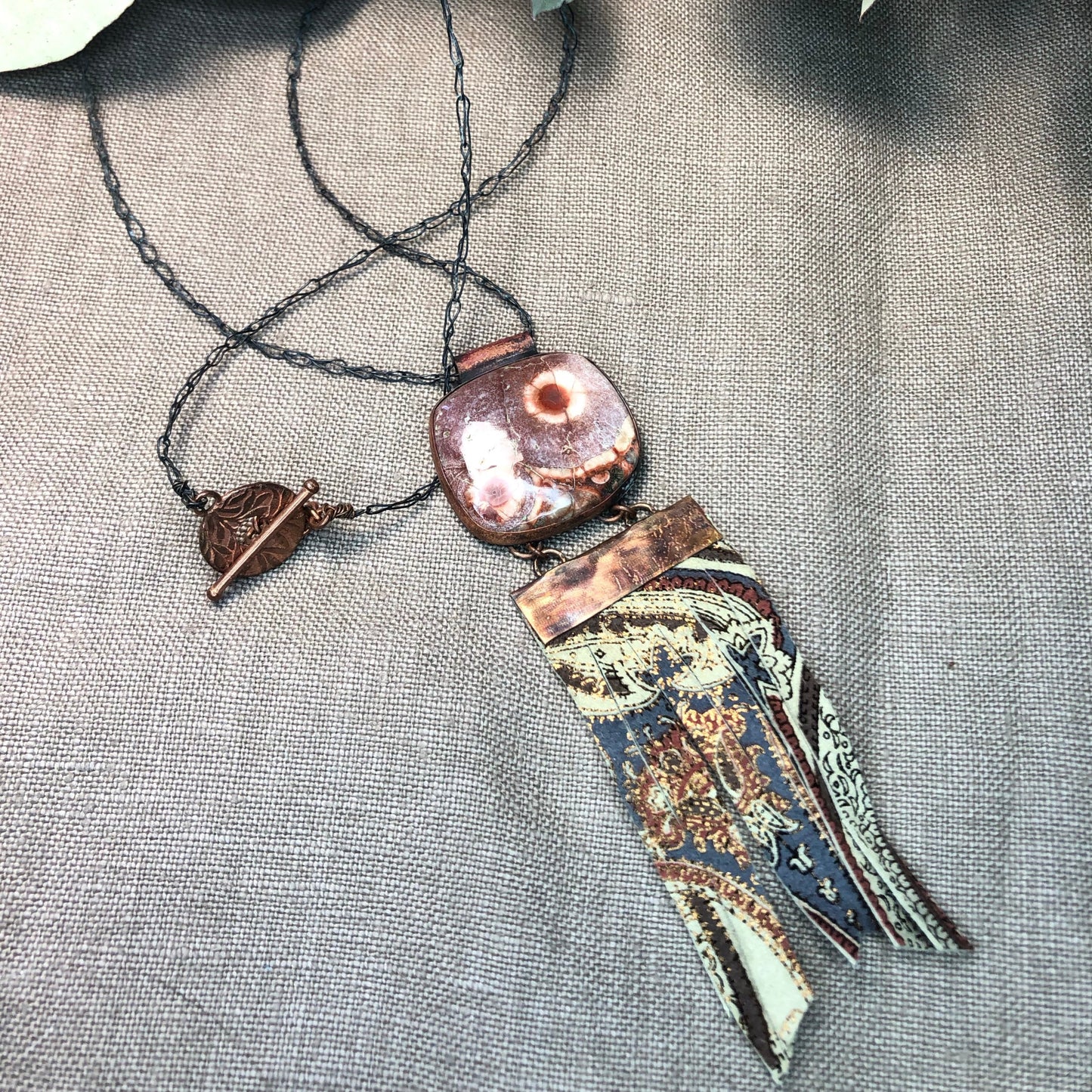 Copper, Birdseye rhyolite, and embossed leather necklace