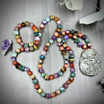 Load image into Gallery viewer, Long Knotted Statement Necklace with Carved Pyrite Dragon
