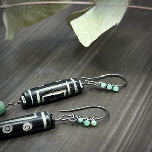 Carved Bone Earrings with Black Spinel and Emeralds