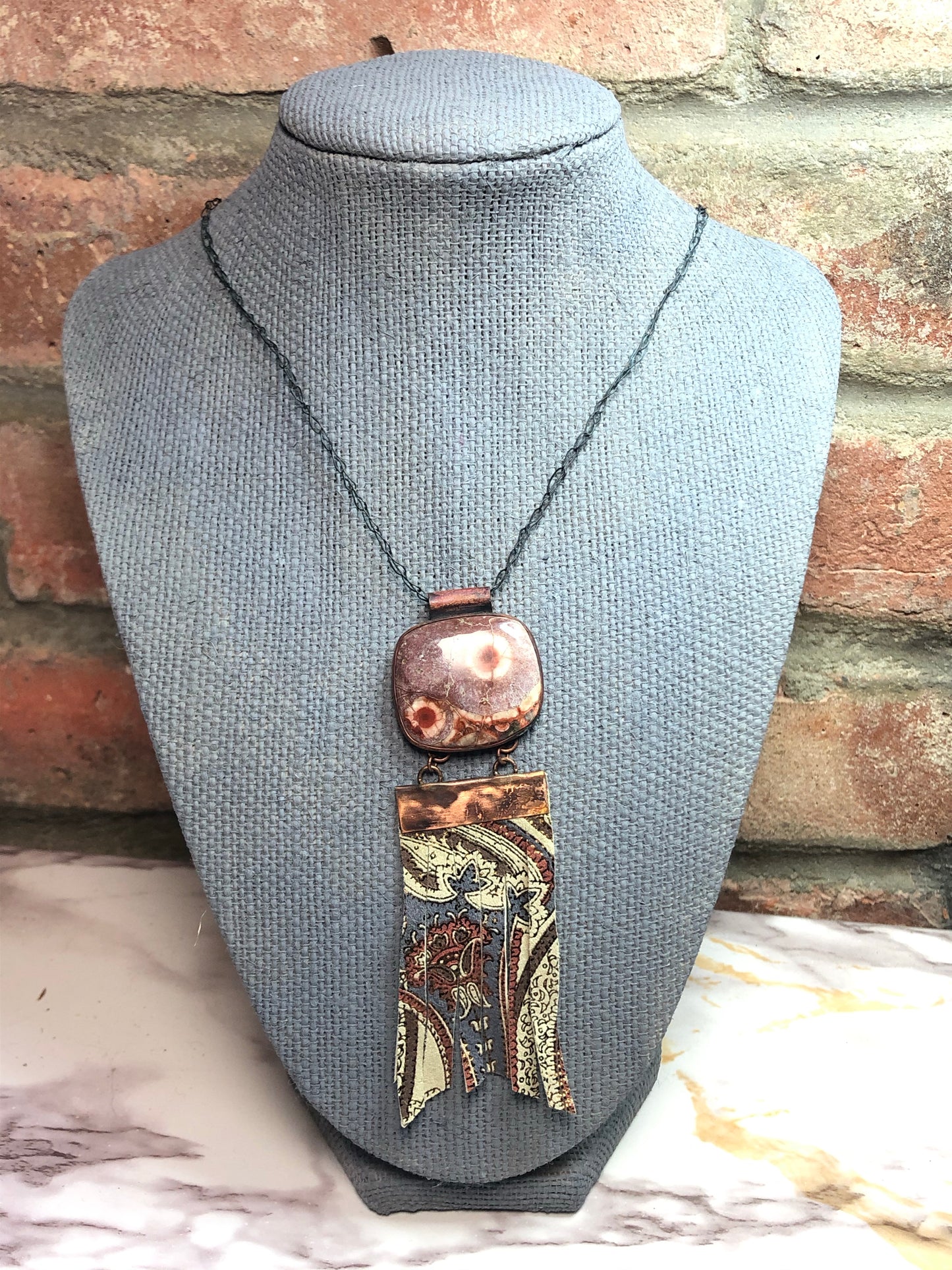 Copper, Birdseye rhyolite, and embossed leather necklace
