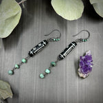 Load image into Gallery viewer, Carved Bone Earrings with Black Spinel and Emeralds
